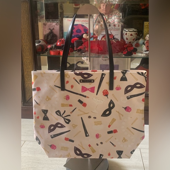 kate spade Handbags - Kate Spade Pink and Black Tote Bag with Cosmetic Print